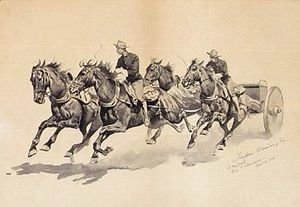 Team of calvary horses pulling a caisson